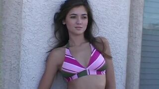 Stripping teen chick takes off her bikini