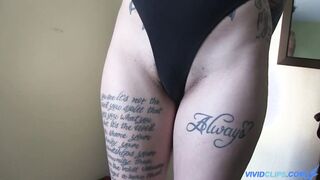 Two inked lezzies enjoying strapon dildo