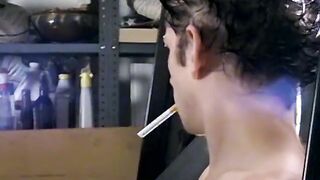 Attractive Ian Madrox is blowing smoke & starts stretching his meat in his smo