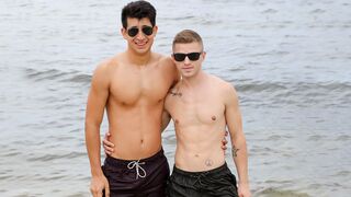 Gay men having fun by the shore then in the hotel room